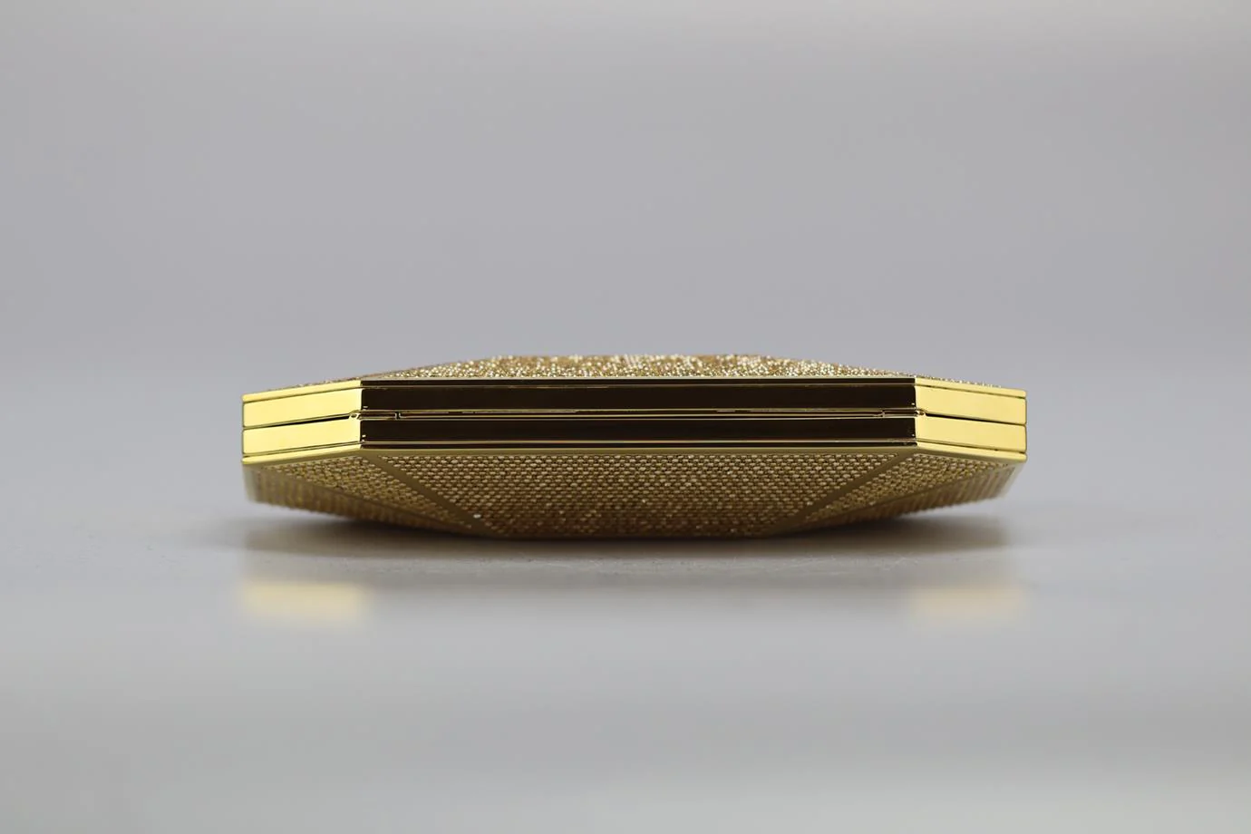 STARK CRYSTAL EMBELLISHED GOLD TONE CLUTCH - Image 6