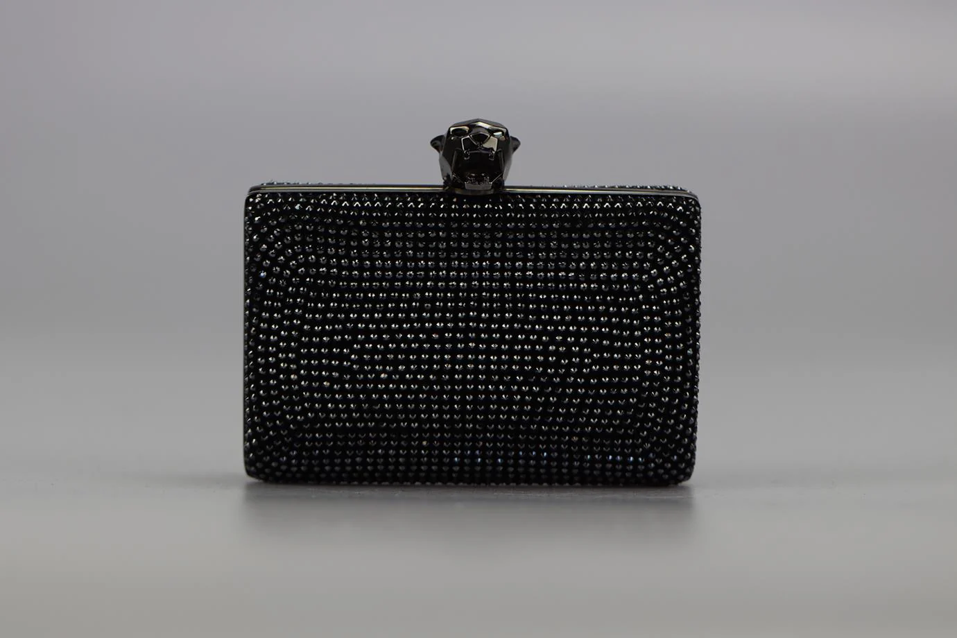STARK CRYSTAL EMBELLISHED SUEDE AND GUNMETAL TONE CLUTCH - Image 2