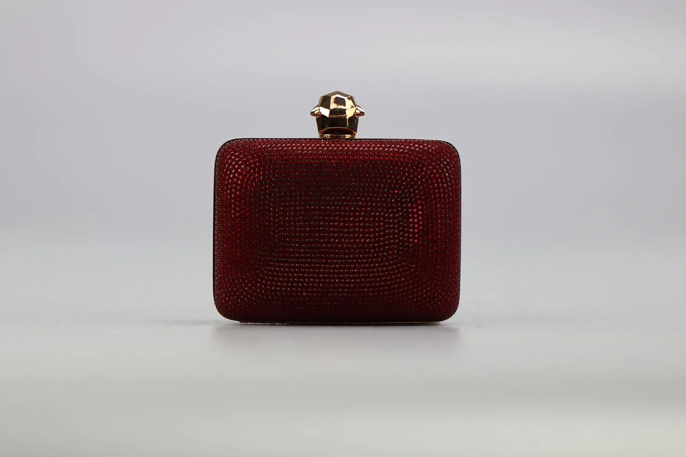 STARK CRYSTAL EMBELLISHED SUEDE AND ROSE GOLD TONE CLUTCH - Image 3