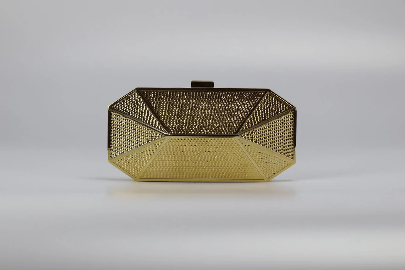 STARK EMBOSSED GOLD TONE CLUTCH - Image 4