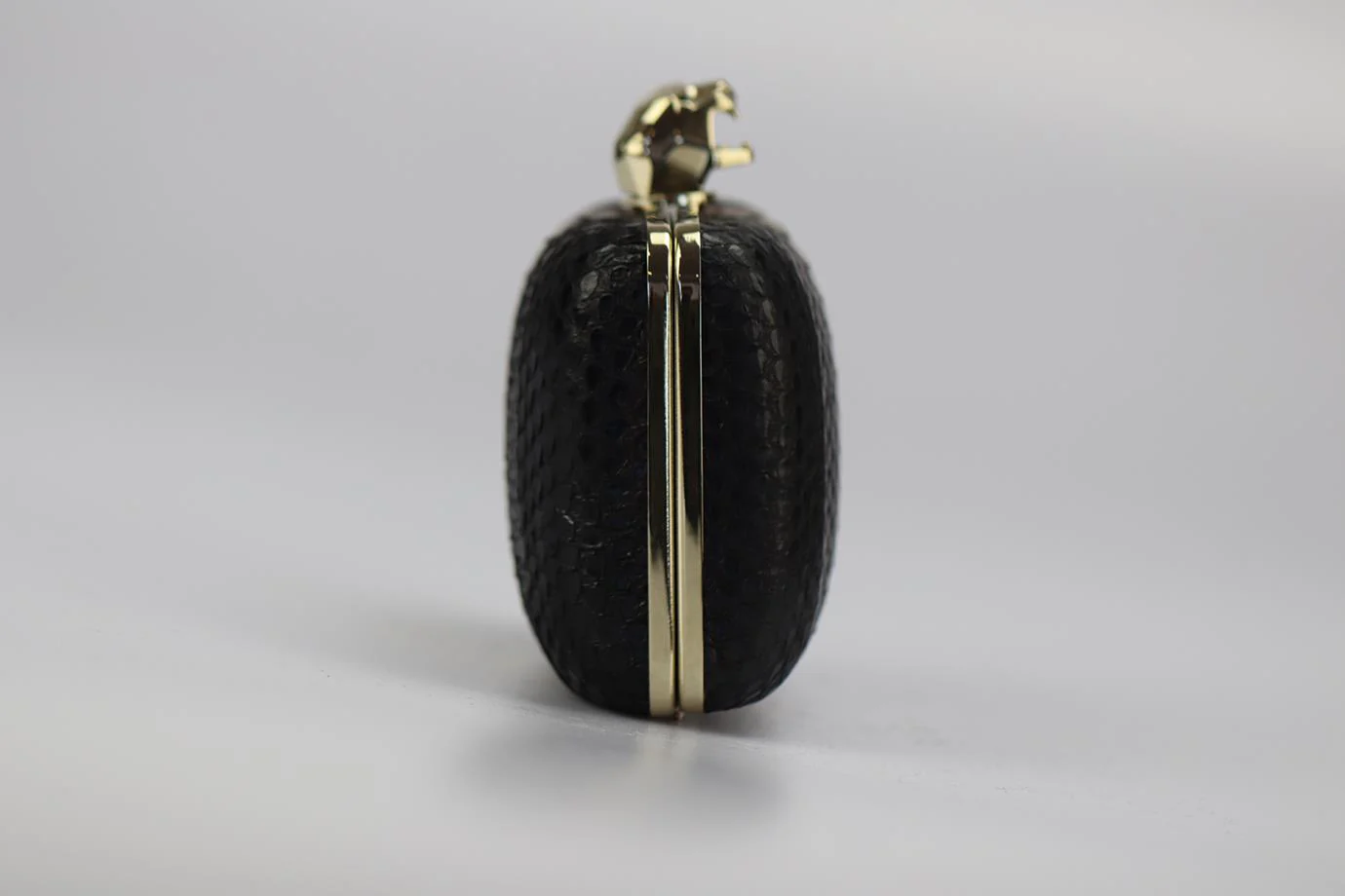 STARK PYTHON AND SILVER TONE CLUTCH - Image 5