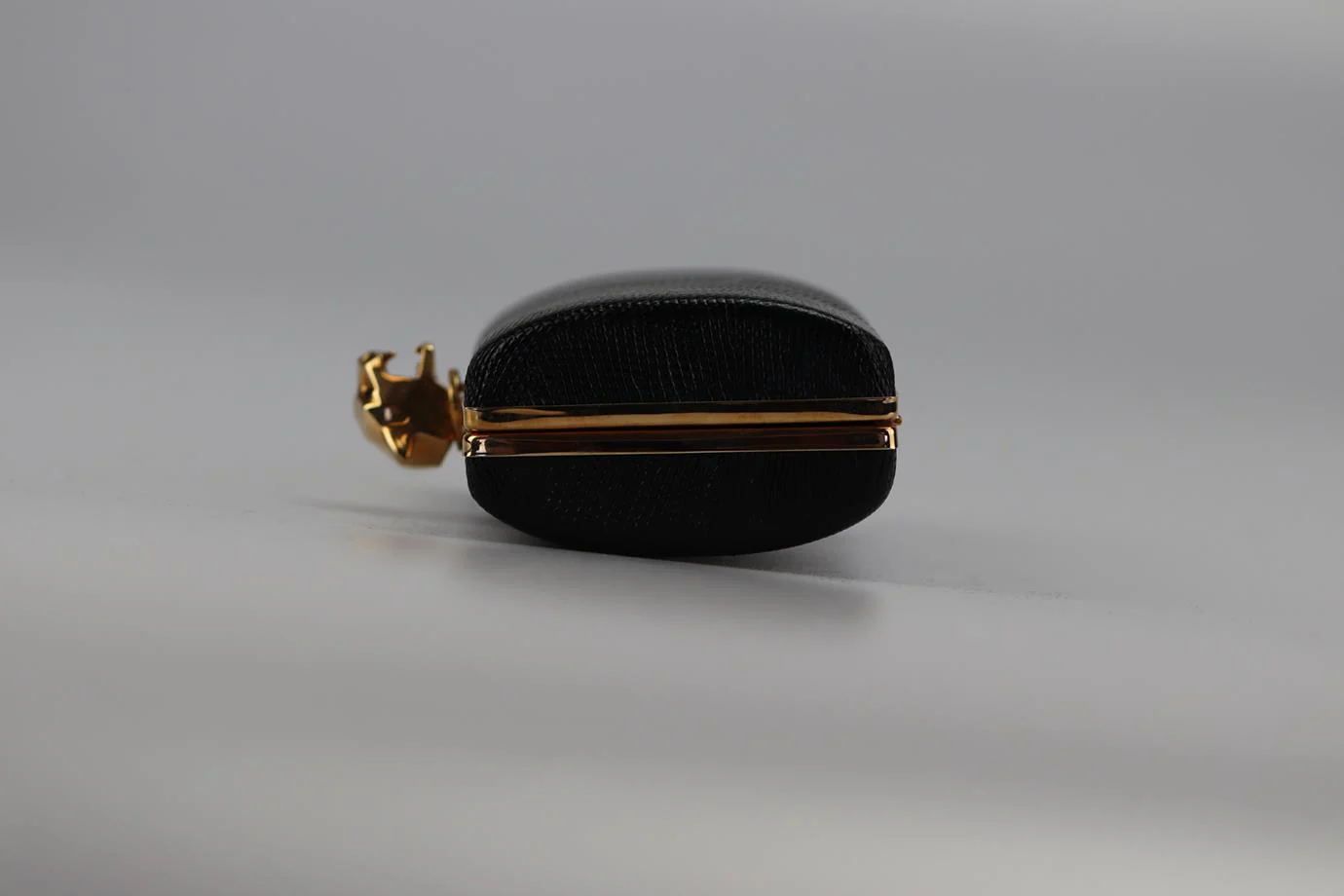 STARK SNAKESKIN AND ROSE GOLD TONE CLUTCH - Image 5