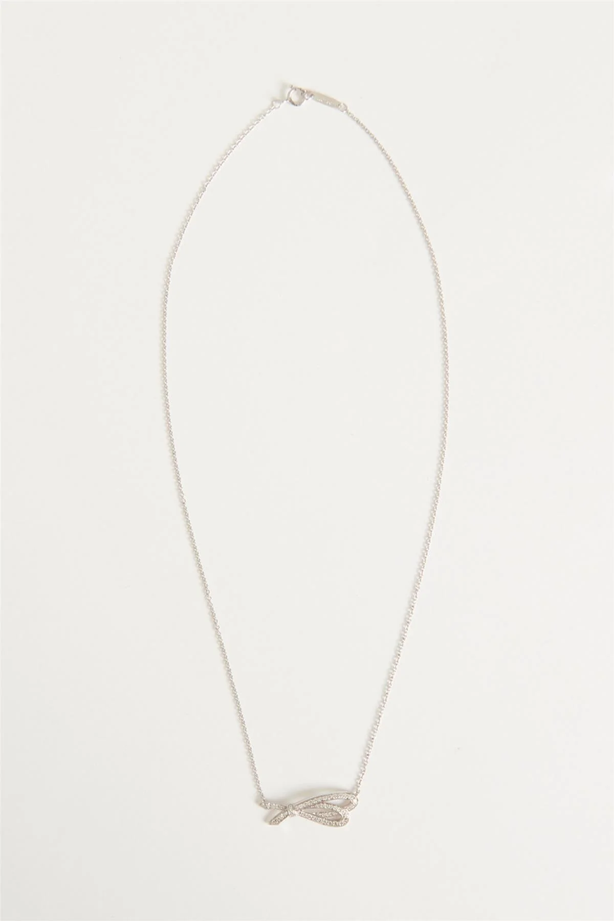 TIFFANY & CO. BOW 18K WHITE GOLD AND DIAMOND NECKLACE - Image 2